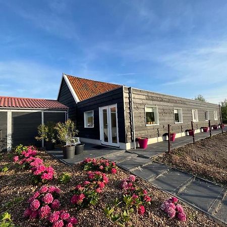 De Tulp Acomodação com café da manhã Noordgouwe Exterior foto